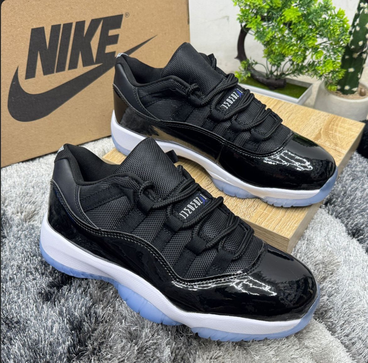 Jordan Retro 11 Low Space Jam negras patent leather suela ICY mayorista Colombia 2026 triple AAA replica desde 108000 COP envios 1-2 dias toda Colombia