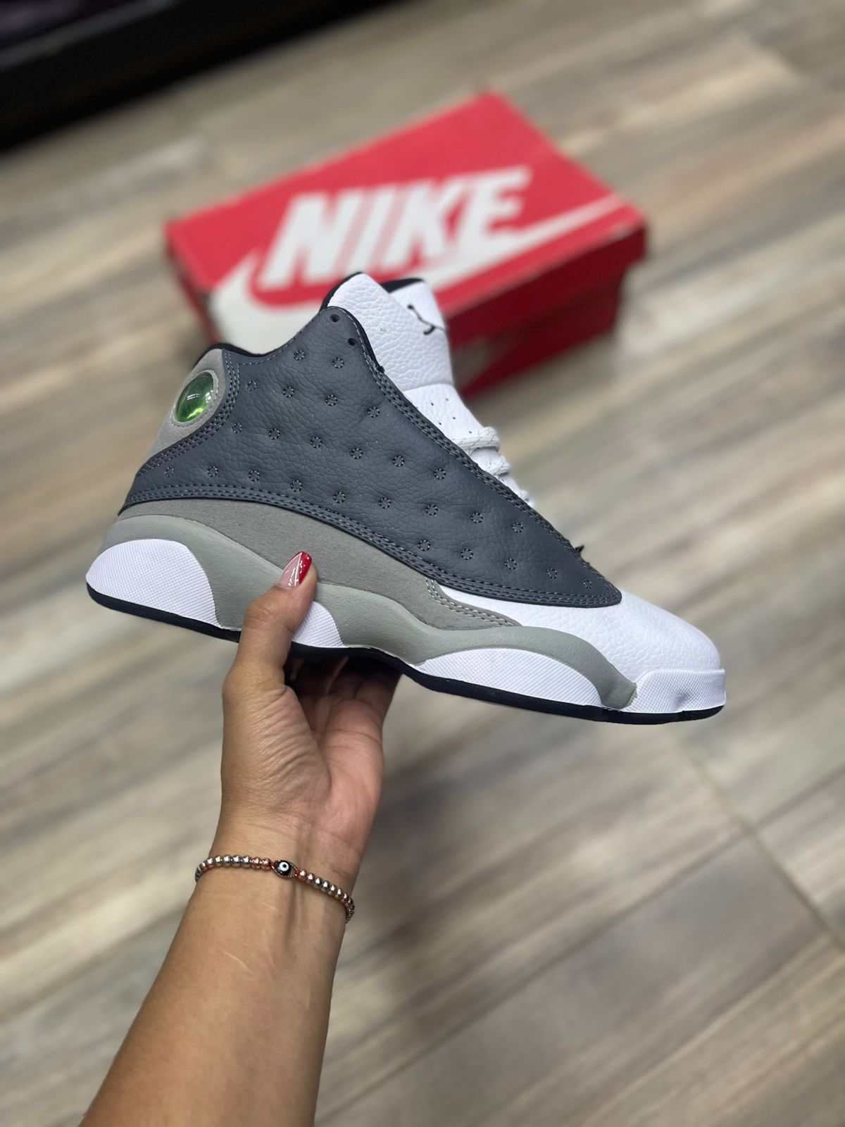 tenis Jordan 13 triple AAA suela garra pantera detalle Colombia mayorista